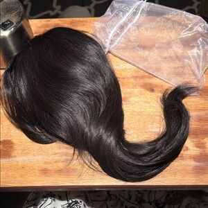 # 34 - 21” Elegant Black Hair Extension Pony with a soft wave